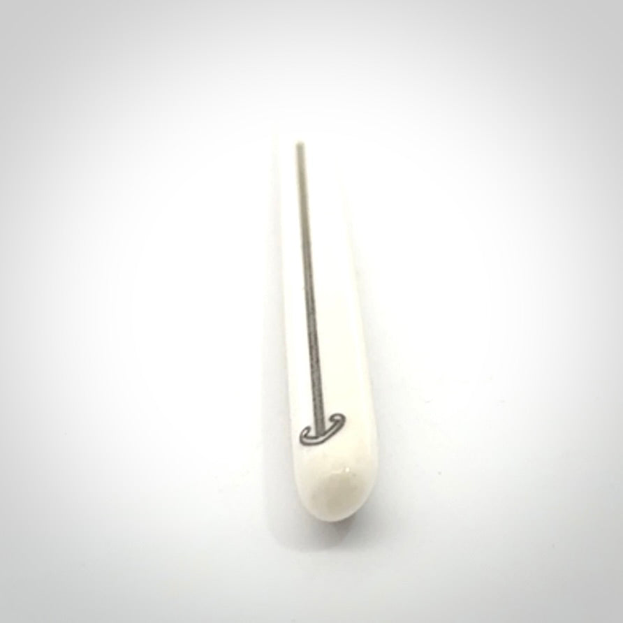 Hand carved bone hair pin with double sided koru design.