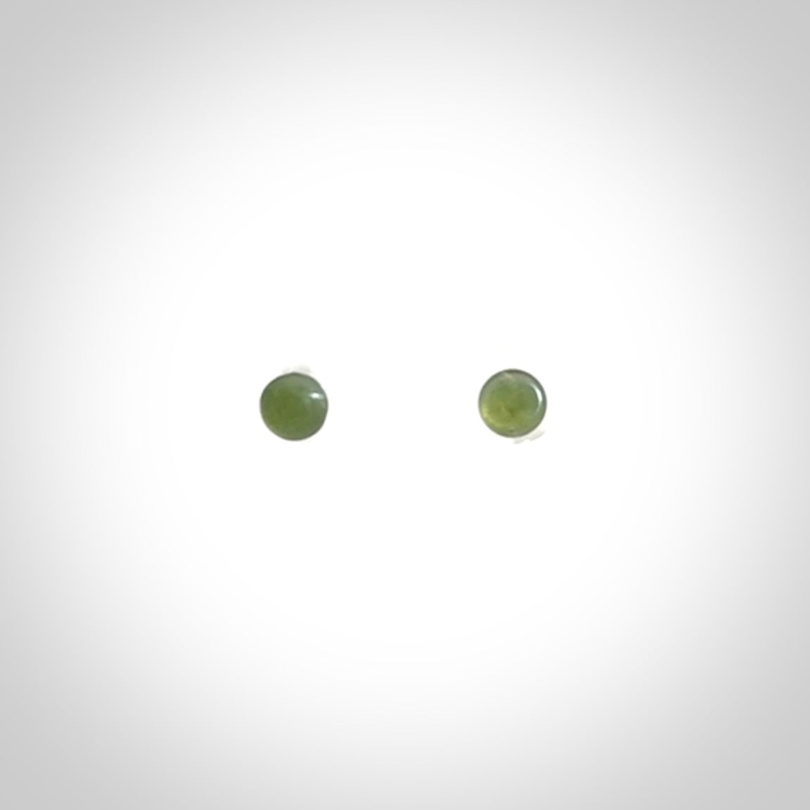 Hand carved small New Zealand Jade and Sterling Silver stud earrings.