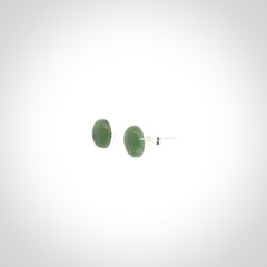Hand carved small New Zealand Jade and Sterling Silver stud earrings.