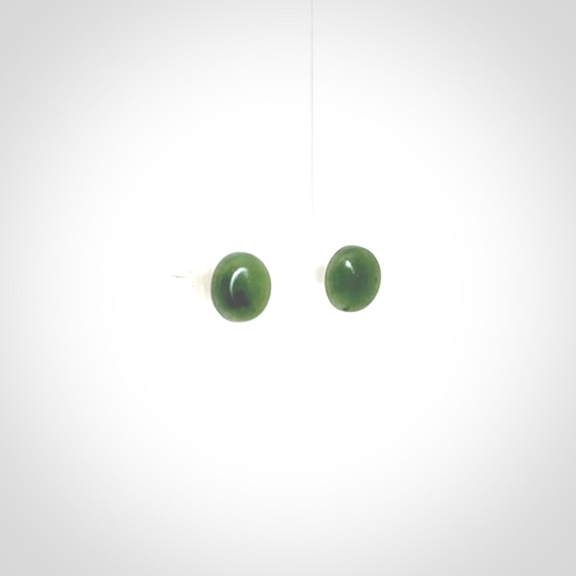 Hand carved small New Zealand Jade and Sterling Silver stud earrings.