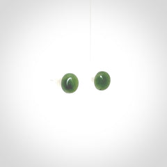 Hand carved small New Zealand Jade and Sterling Silver stud earrings.