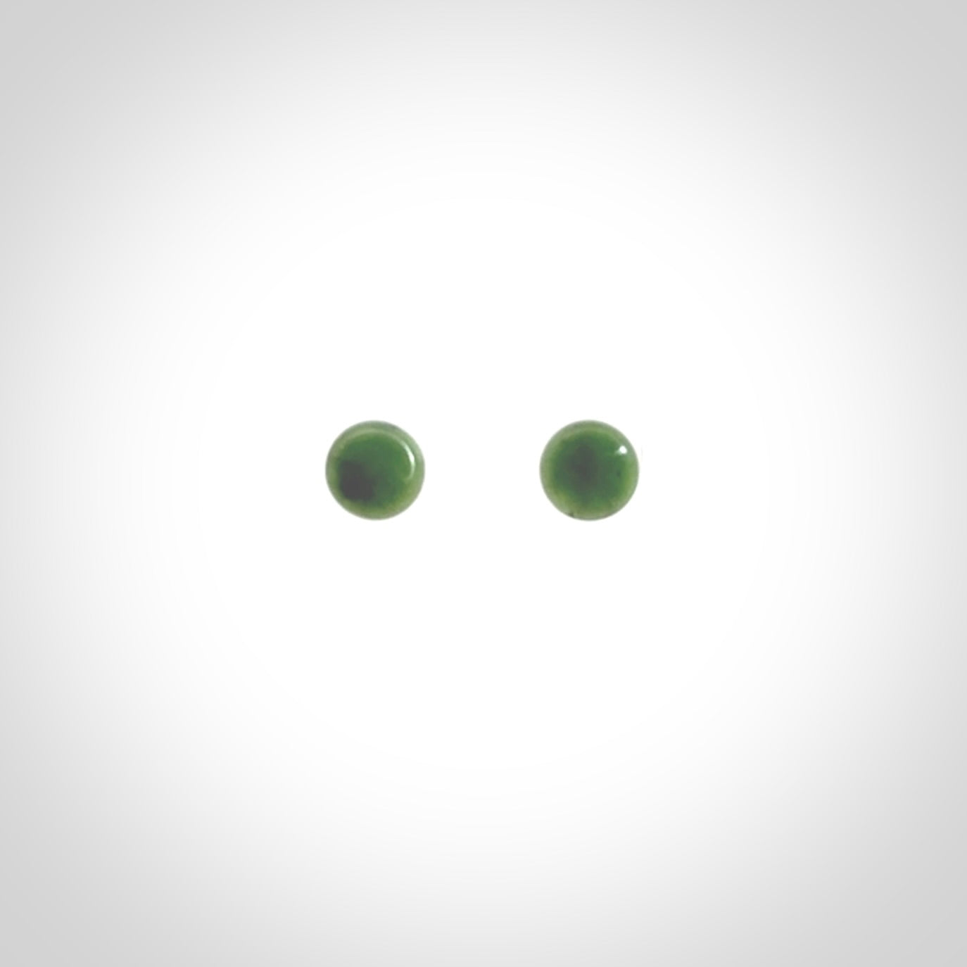 Hand carved small New Zealand Jade and Sterling Silver stud earrings.