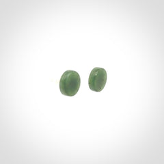 Hand carved New Zealand Jade and Sterling Silver stud earrings.