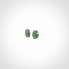 Hand carved New Zealand Jade and Sterling Silver stud earrings.