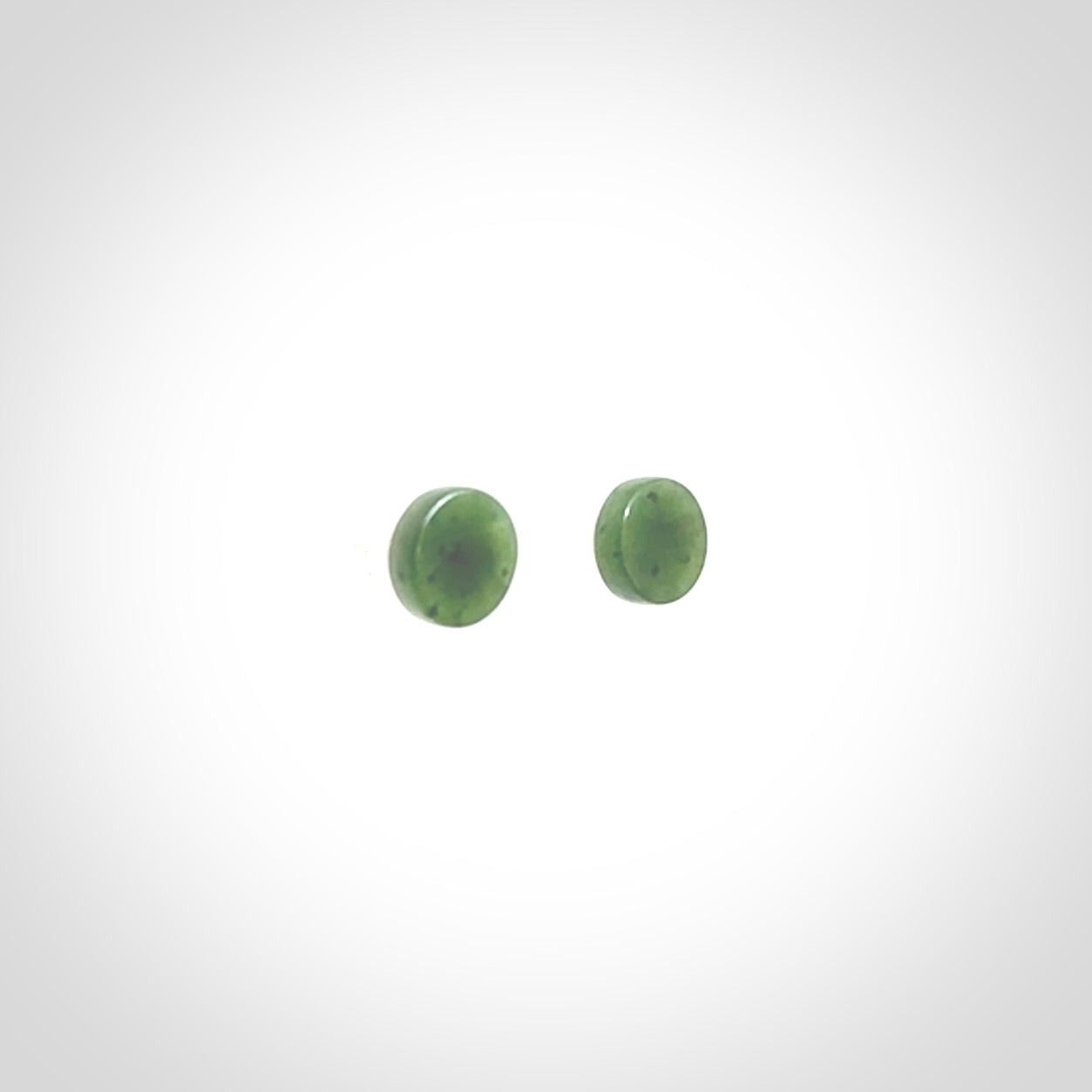 Hand carved New Zealand Jade and Sterling Silver stud earrings.