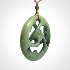 Hand carved New Zealand jade, complex twist drop pendant. Hand made complex twist pendant hand carved in New Zealand.