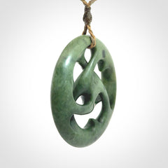 Hand carved New Zealand jade, complex twist drop pendant. Hand made complex twist pendant hand carved in New Zealand.