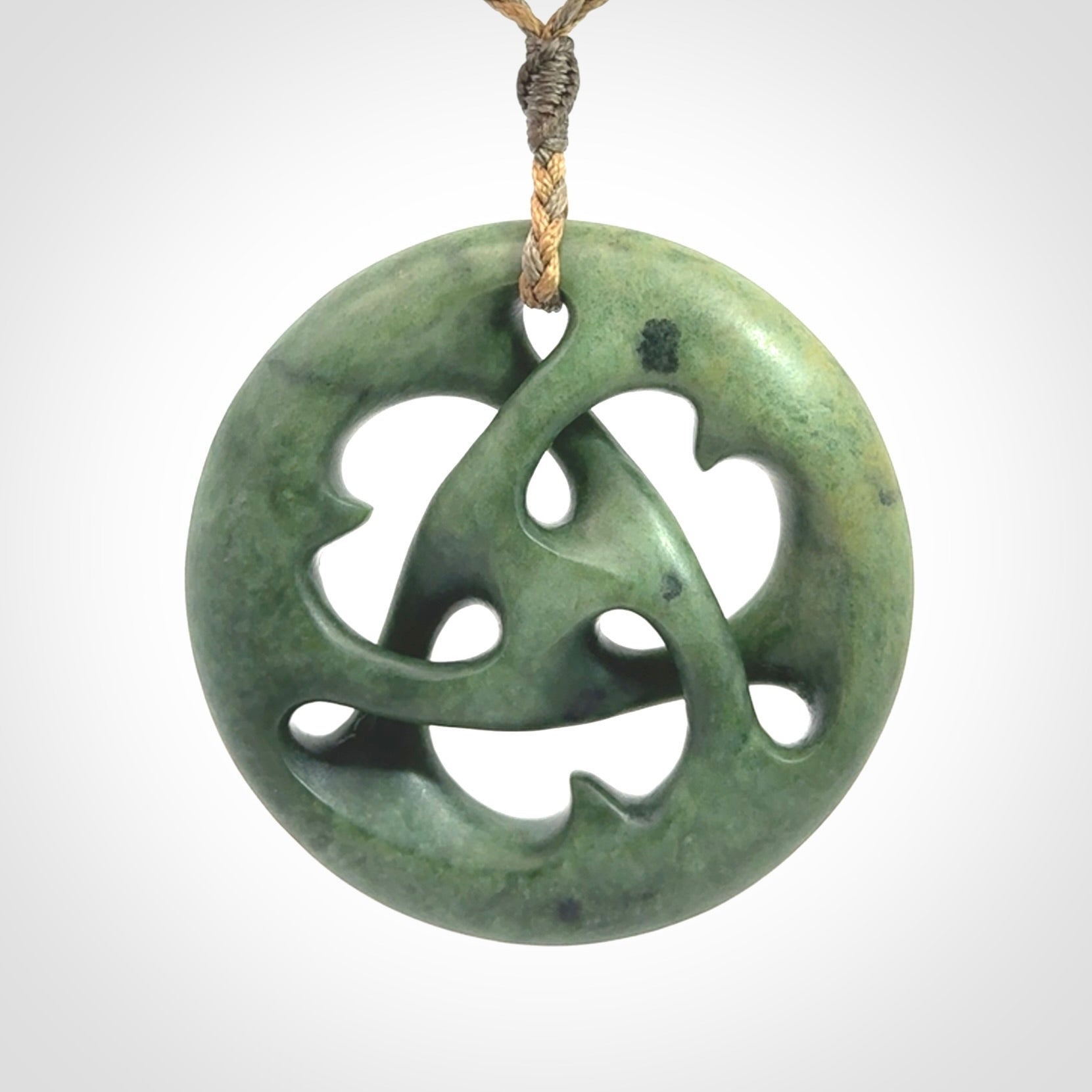 Hand carved New Zealand jade, complex twist drop pendant. Hand made complex twist pendant hand carved in New Zealand.