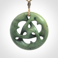 Hand carved New Zealand jade, complex twist drop pendant. Hand made complex twist pendant hand carved in New Zealand.