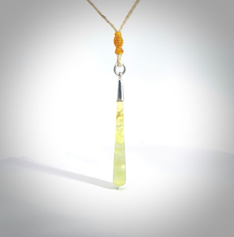 Hand carved Prehnite Crystal Drop Pendant. Made by NZ Pacific and for sale online. Exotic, Hand made Jewellery made in New Zealand.