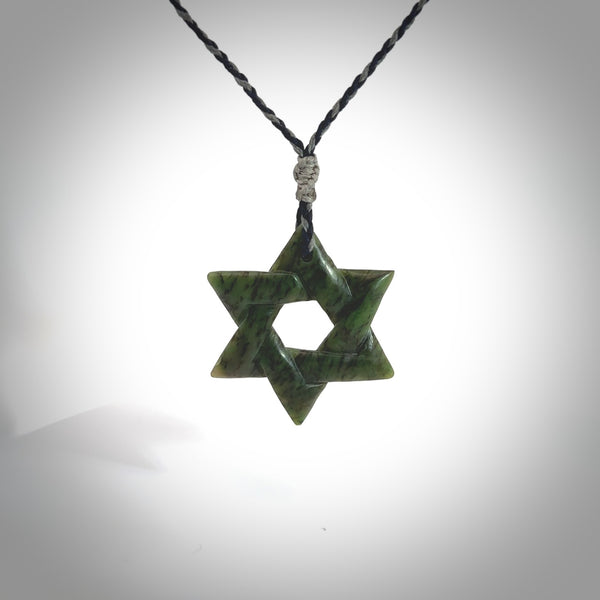 Star of David pendant hand carved from New Zealand Green Jade. Made by NZ Pacific and for sale worldwide. Postage is included in the price.