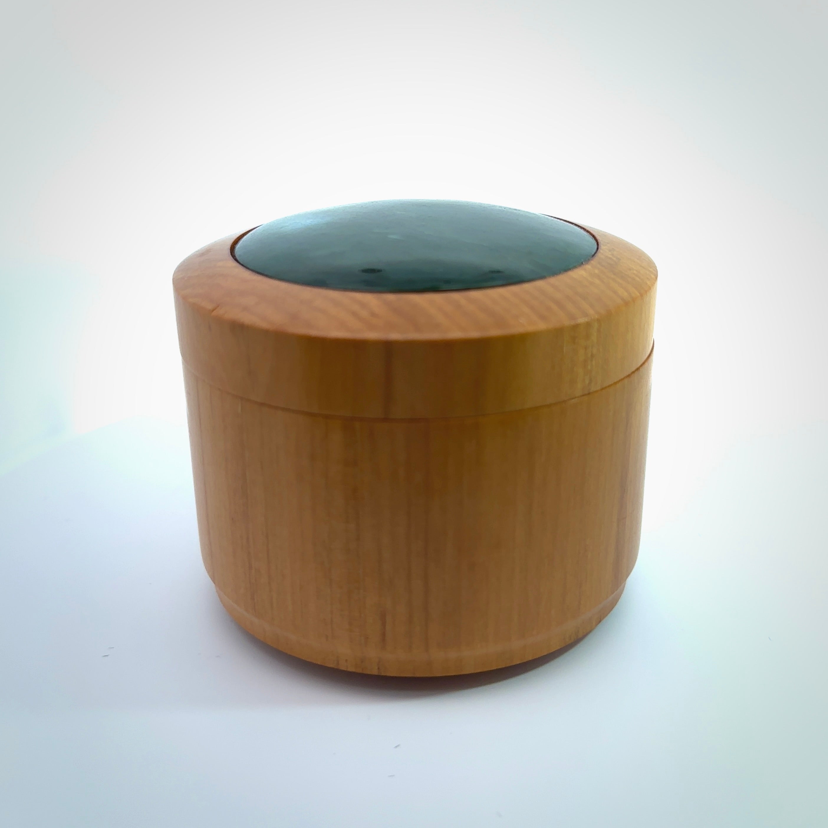 Wooden gift box made in New Zealand from native Rimu with New Zealand Jade lid. Jewellery box hand made from wood and Pounamu.