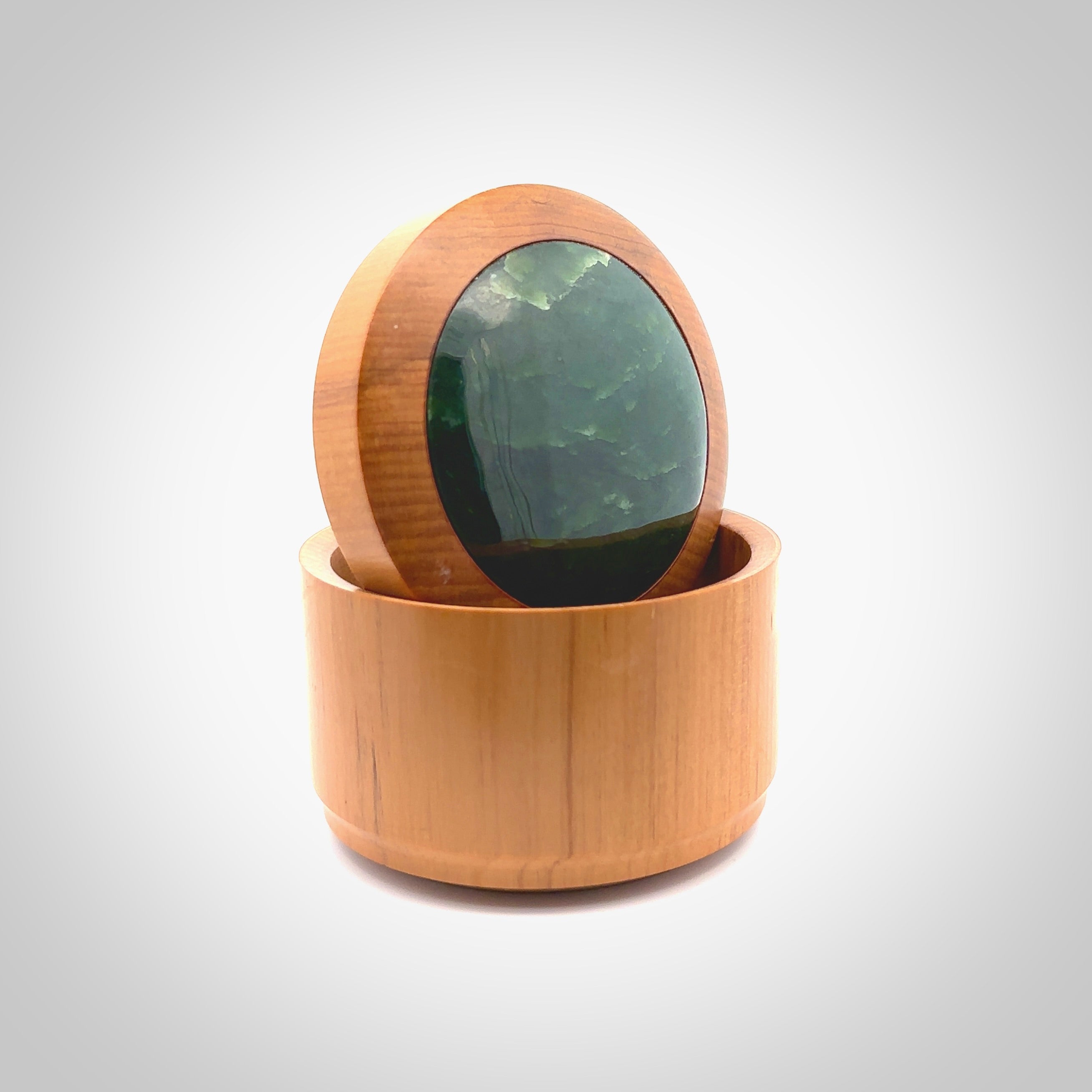 Wooden gift box made in New Zealand from native Rimu with New Zealand Jade lid. Jewellery box hand made from wood and Pounamu.