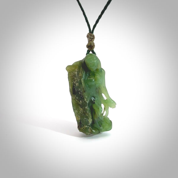 This is a lovely New Zealand Jade, woman carved into the jade stone drop pendant. Hand carved for us in Jade. It is bound with an adjustable brown coloured cord which is length adjustable. Free worldwide shipping.