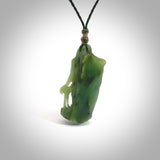 This is a lovely New Zealand Jade, woman carved into the jade stone drop pendant. Hand carved for us in Jade. It is bound with an adjustable brown coloured cord which is length adjustable. Free worldwide shipping.