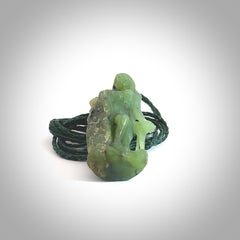This is a lovely New Zealand Jade, woman carved into the jade stone drop pendant. Hand carved for us in Jade. It is bound with an adjustable brown coloured cord which is length adjustable. Free worldwide shipping.