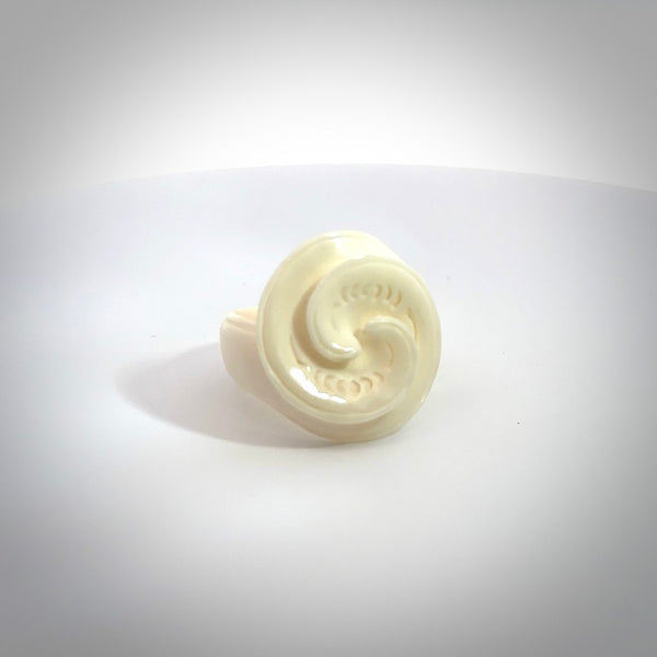 Hand carved natural bone koru style ring. Natural bone ring with koru design. Hand made ring, delivered with international airmail. Postage is included. One only bone ring.
