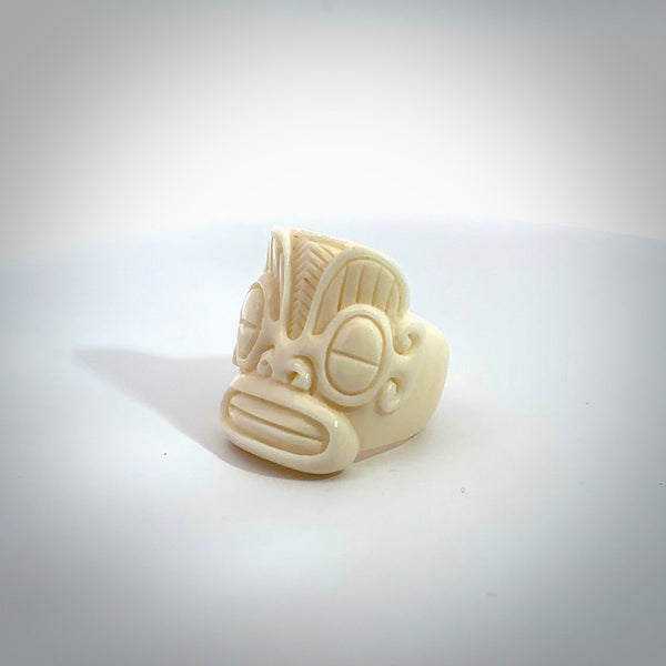 Hand carved natural bone tribal face ring. Natural bone ring with face design. Hand made ring, delivered with international airmail. Postage is included. One only bone ring.