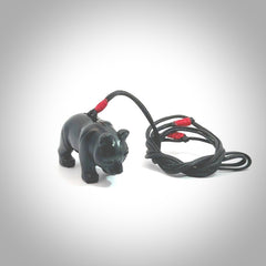 This picture shows a pendant that we designed in black jade. It is a little black bear that has a walking stance and is carved in detail. A really attractive and eye-catching piece of handmade jewellery. The cord is black and the length can be adjusted.