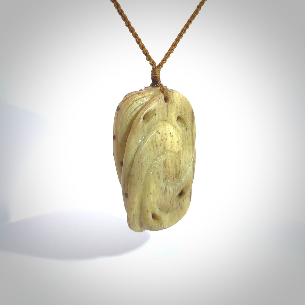 HAND MADE AOTEA STONE, WHALE BONE FACE PENDANT WITH RUBY AND SAPPHIRES ...