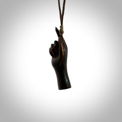 Hand carved hard wood number one hand pendant. Carved by NZ Pacific and for sale online. Unique, handmade jewellery.