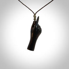 Hand carved hard wood number one hand pendant. Carved by NZ Pacific and for sale online. Unique, handmade jewellery.