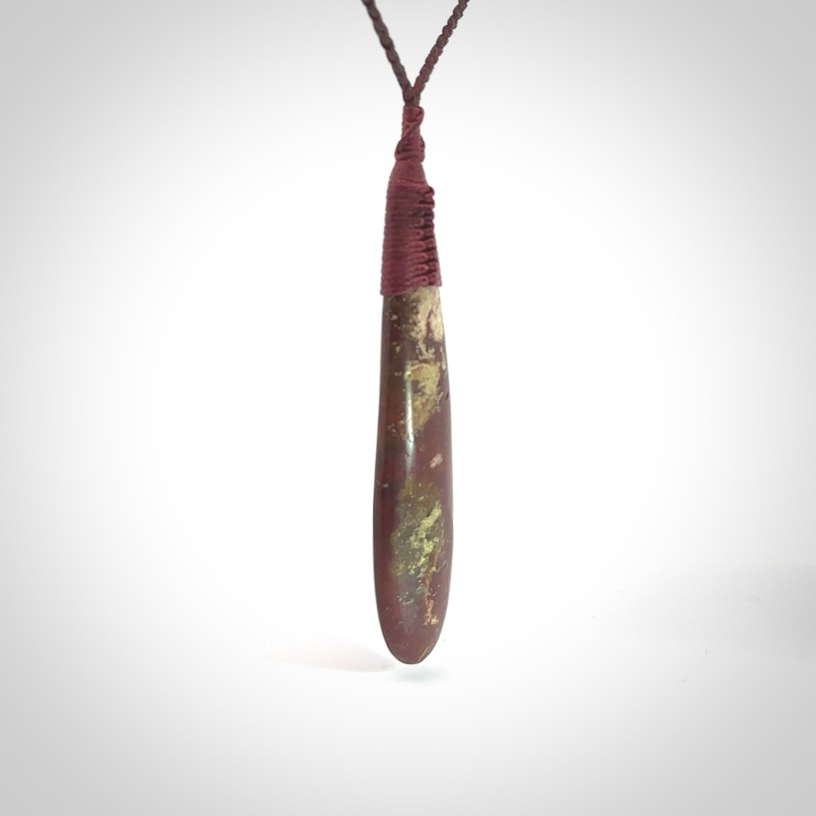 Hand carved Red Jasper Stone contemporary drop pendant. Carved by NZ Pacific in Jasper Stone. This is a modern drop pendant made from natural materials.