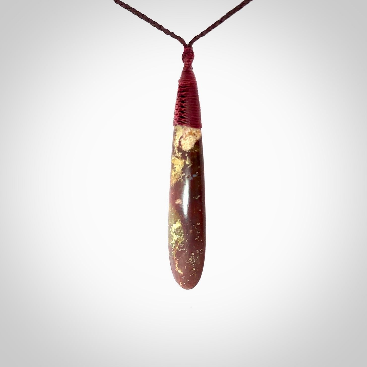 Hand carved Red Jasper Stone contemporary drop pendant. Carved by NZ Pacific in Jasper Stone. This is a modern drop pendant made from natural materials.