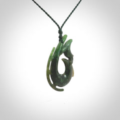 Hand carved Jade Hook with whale pendant. Hand carved by NZ Pacific, jade jewellery for sale online.