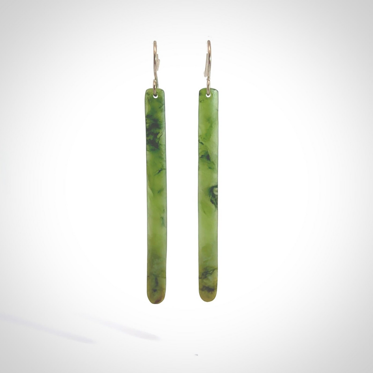 Hand carved large New Zealand jade drop earrings. Made by NZ Pacific from real jade. Online jewellery for sale online by NZ Pacific. Hand carved here in New Zealand by Ric Moor.