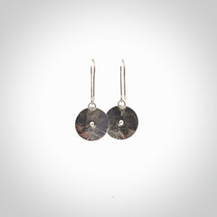 These are a pair of beautiful Aotea Stone and sterling silver earrings. It is carved from Aotea Stone from New Zealand. It is a light blue and white colour with sterling silver. Hand made here in New Zealand by Ana Krakosky.