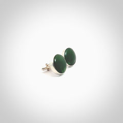 Hand made fashionable cufflinks from New Zealand Jade and sterling silver. Hand crafted here in New Zealand. Hand made art to wear from New Zealand Jade and Sterling Silver. A one off pair of classy cufflinks for men. Online shopping made easy.