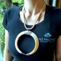 Boars Tusk Pendant with a sterling silver cap. Hand made pendant carved from a boars tusk. Hand made unique jewellery for sale by NZ Pacific online.