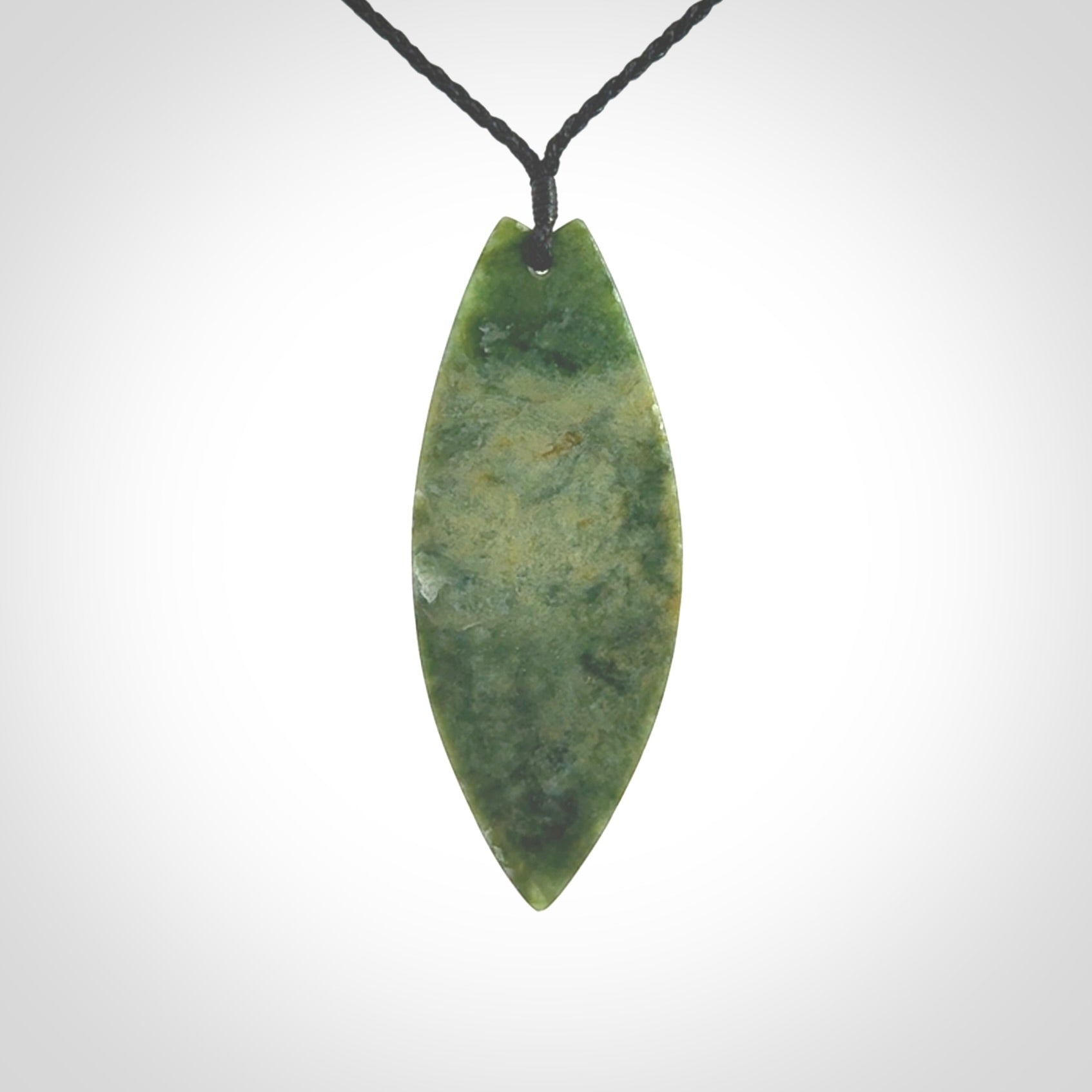 Hand carved New Zealand jade contemporary drop pendant. Hand carved in New Zealand by Darren Hill, jade artist, for NZ Pacific. One only, unique drop necklace with black adjustable cord. Free shipping worldwide.