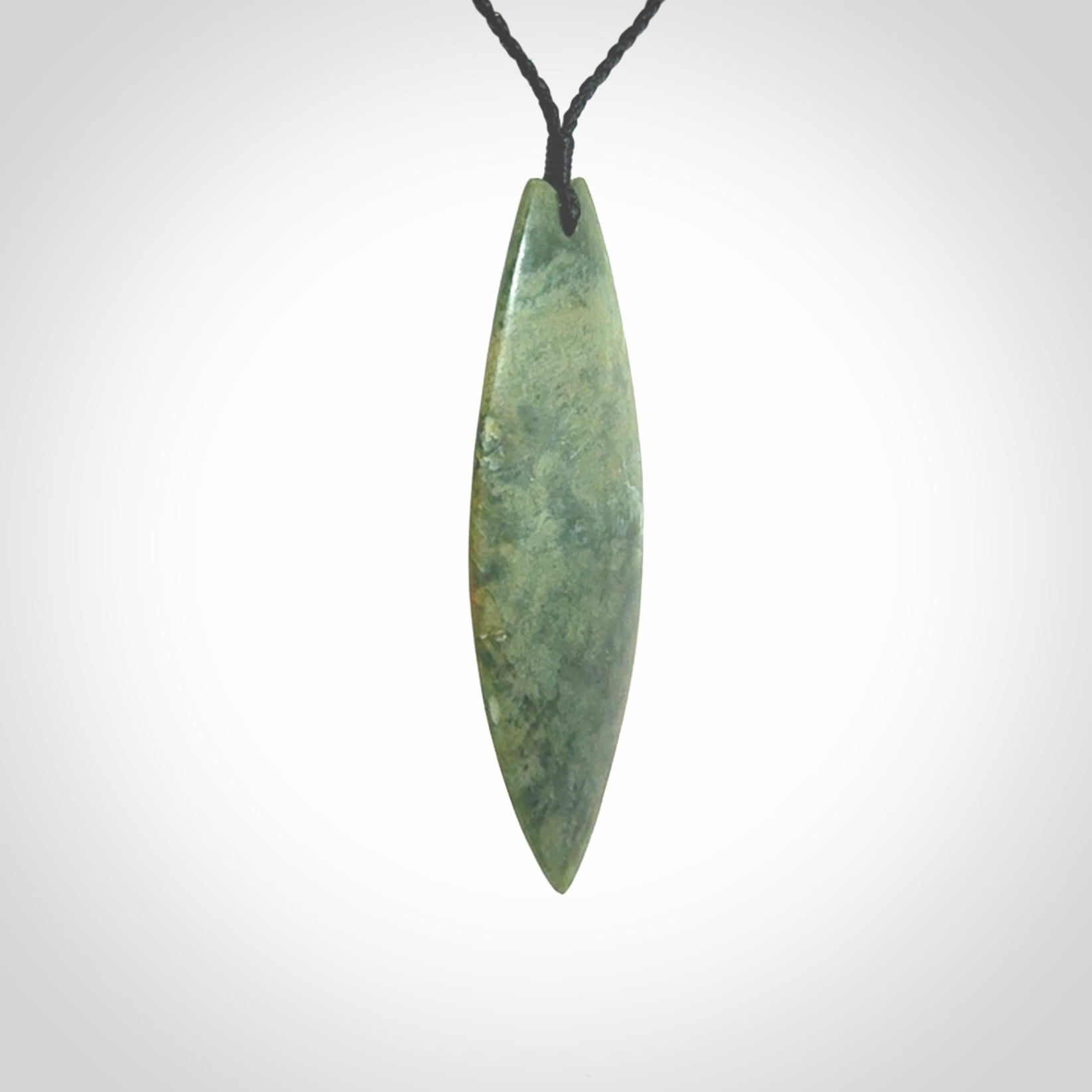 Hand carved New Zealand jade contemporary drop pendant. Hand carved in New Zealand by Darren Hill, jade artist, for NZ Pacific. One only, unique drop necklace with black adjustable cord. Free shipping worldwide.