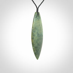 Hand carved New Zealand jade contemporary drop pendant. Hand carved in New Zealand by Darren Hill, jade artist, for NZ Pacific. One only, unique drop necklace with black adjustable cord. Free shipping worldwide.