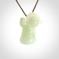 Jadeite monk pendant with adjustable necklace cord. Hand carved by NZ Pacific. Handmade jewellery for sale online. The cord is a hand plaited khaki green colour, which is length adjustable. Peaceful man necklace for men and women. Contemporary necklace hand made from Jadeite.