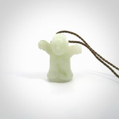 Jadeite monk pendant with adjustable necklace cord. Hand carved by NZ Pacific. Handmade jewellery for sale online. The cord is a hand plaited khaki green colour, which is length adjustable. Peaceful man necklace for men and women. Contemporary necklace hand made from Jadeite.