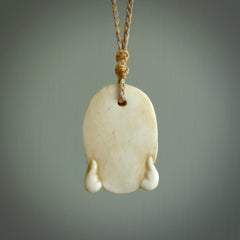 Hand carved incredible stained bone gargoyle face carving. A stunning work of art. This pendant was hand carved in bone with buffalo horn inlay for the eyes by Yuri Terenyi. A one off collectors item that has been hand crafted to be worn or displayed.