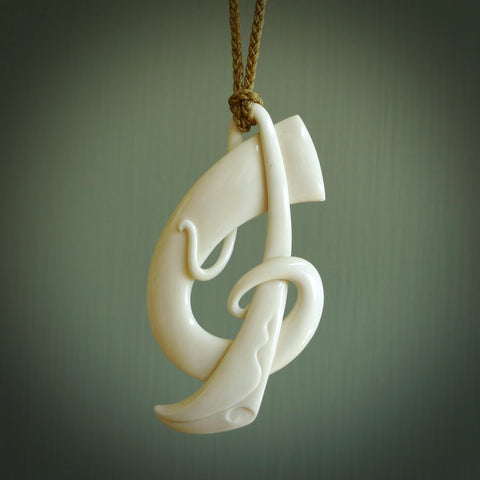 Maori Koru Wave Fish Hook Hand Carved Bone Naturally Stained | Etsy | Hand  carved jewelry, Bone carving, Wood jewelery