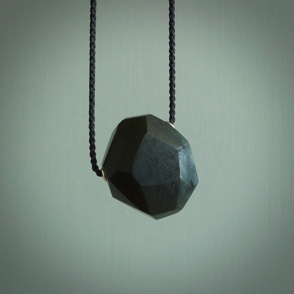 Hand carved Australian Black Jade  drop pendant. Made by Ana Krakosky for NZ Pacific in Australian black jade. A beautiful black jade necklace with black adjustable cord.