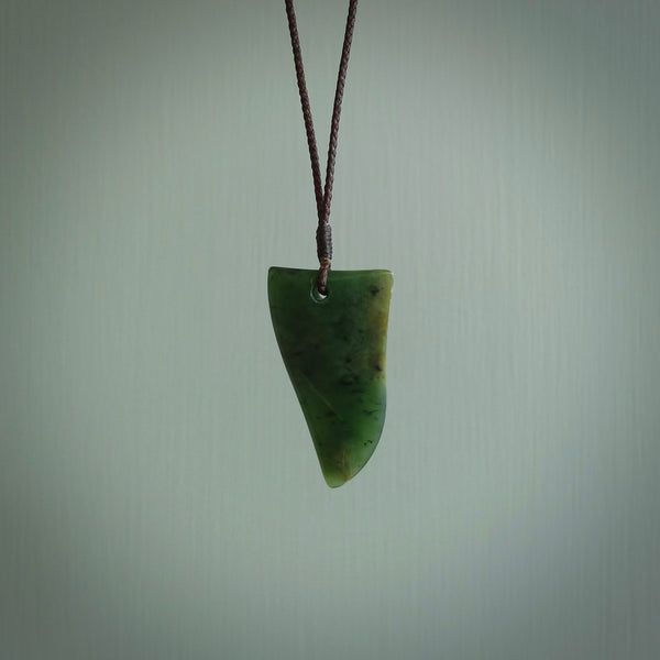 Hand carved jade niho, fang, pendant. Carved by New Zealand artist Ric Moor. Contemporary New Zealand Jade fang, drop necklace. One only unique pendant for men and women.