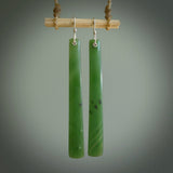 These are stunning large drop shaped jade earrings carved in New Zealand by Josey Coyle. It is carved from a apple green piece of New Zealand Jade and with Sterling Silver hooks.