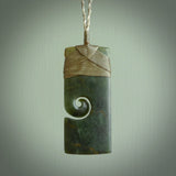 New Zealand jade toki koru pendant. Hand carved in New Zealand. Hand made jewellery.