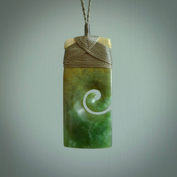 New Zealand jade toki koru pendant. Hand carved in New Zealand. Hand made jewellery.
