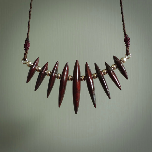Red Jasper Stone drop pendant. Australian Black Jade drop pendant Handmade black jade and Jasper jewellery made by NZ Pacific and for sale online. Jasper stone for men and women. Unique art to wear from NZ Pacific.