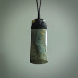 Hand made large New Zealand jade toki pendant. Hand carved in New Zealand by Raegan Bregmen. Hand made jewellery. Unique large Jade Toki with adjustable length black coloured cord. Free shipping worldwide.