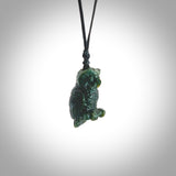 A traditional Owl design carving, hand made for us from Jade. This is a work of art and is a collectable piece of traditional Jade carving. It can be worn as a special piece of jewellery or displayed. This is art made to wear at its finest.