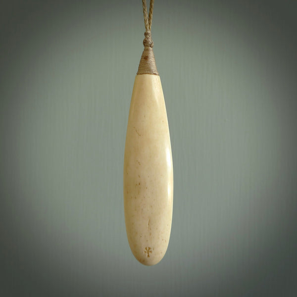 A handcarved masterpiece. A complex twist pendant carved from bone by Yuri Terenyi for NZ Pacific. This is a true piece of wearable art which is collectible. A one-off masterpiece and quite unique. Delivered with Express Courier and gift wrapped in a woven kete pouch.