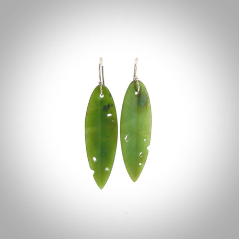 These are stunning heart shaped jade kawakawa leaf earrings carved in New Zealand by Josey Coyle. It is carved from a deep green piece of New Zealand Jade and with Sterling Silver hooks.